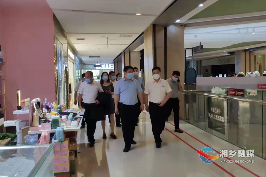 市领导检查商贸领域疫情防控等工作