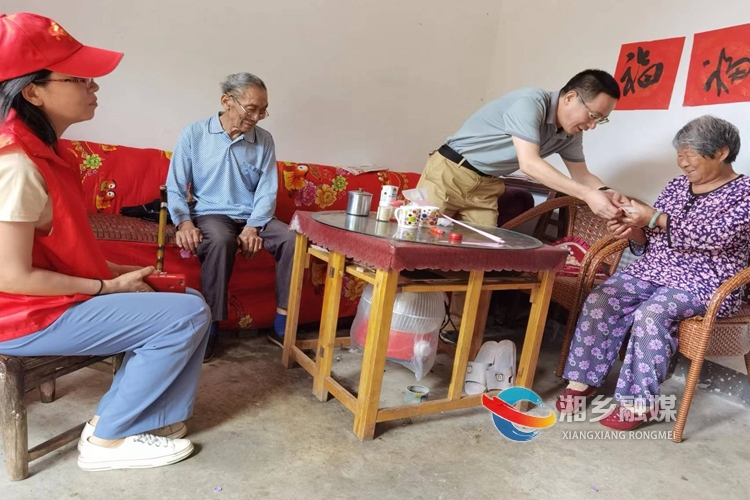 [残联]走村入户送温暖 心系群众暖人心