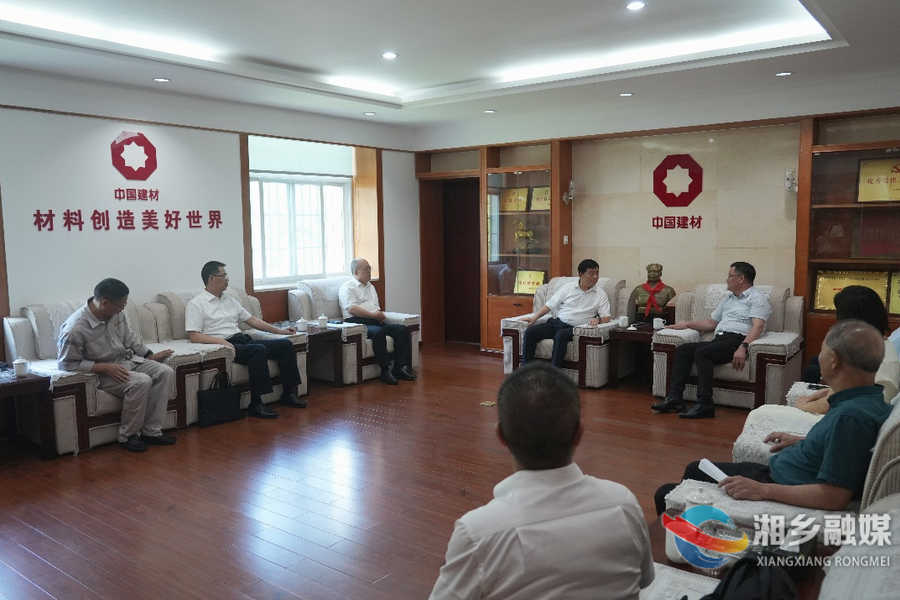 赵新文会见新天山水泥总裁赵新军一行