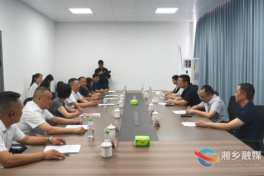 谭何龙：主动靠前服务 护航企业高质量发展